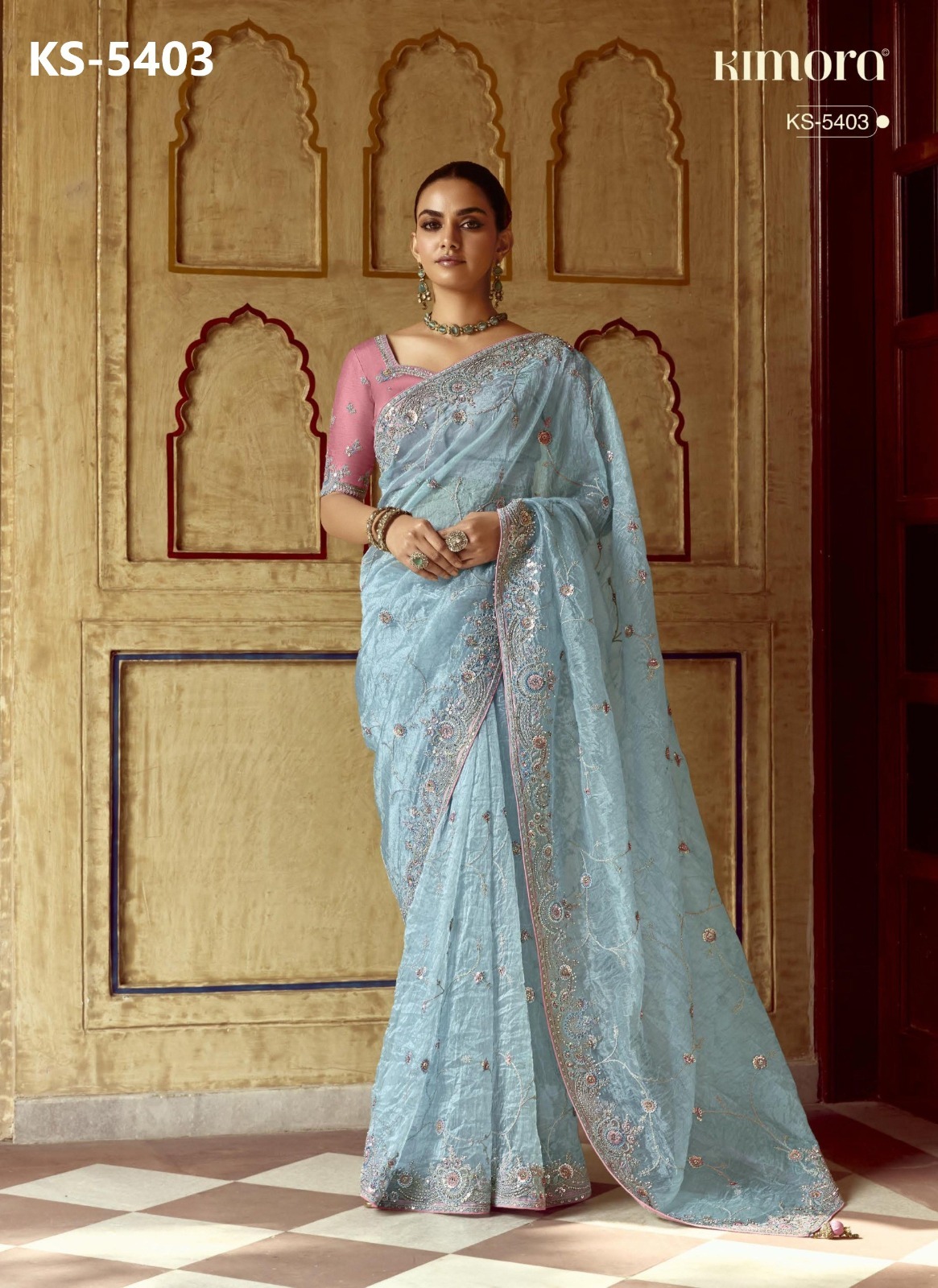 Pure Based Fancy Fabric with An exclusive Hand worked border Saree