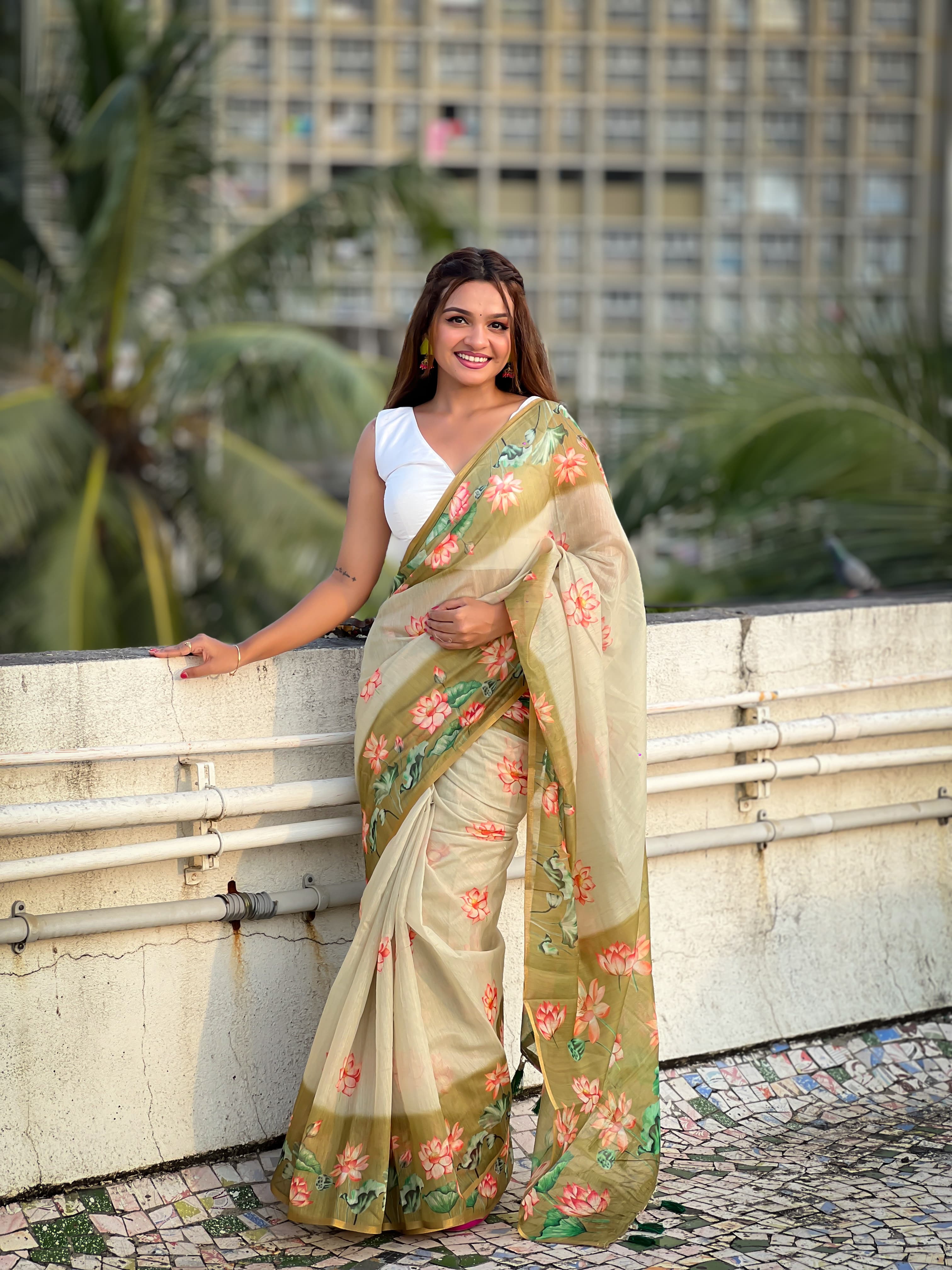 Cotton Sarees with Pichwai prints all over the body having zari woven piping border