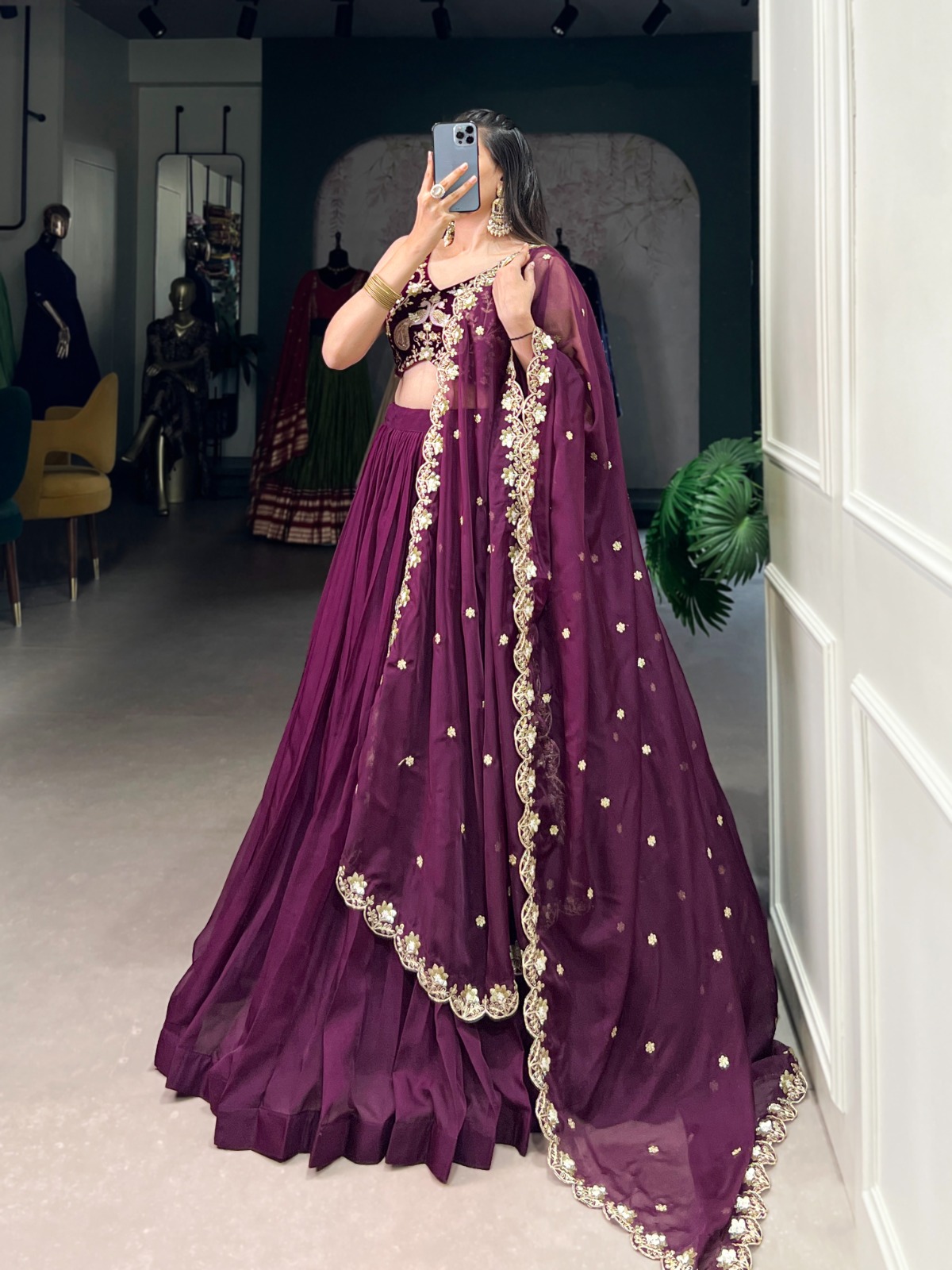 Command attention with every twirl in this wine organza silk lehenga 