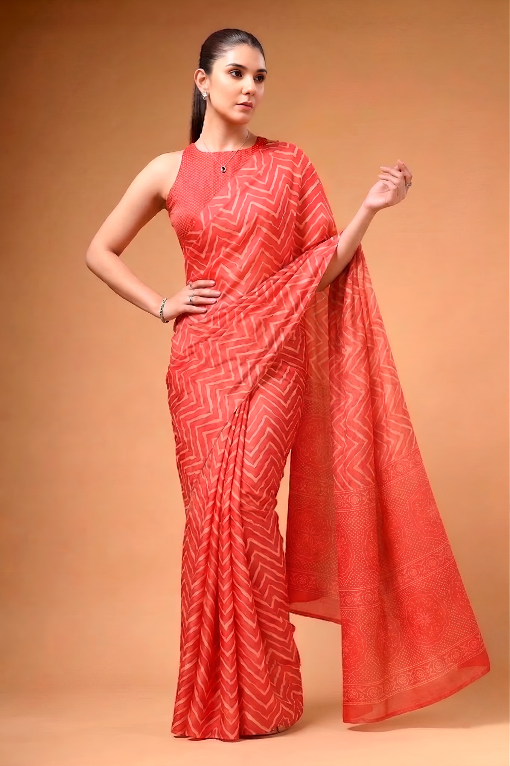 Wrap yourself in the silky elegance of satin with prints Saree