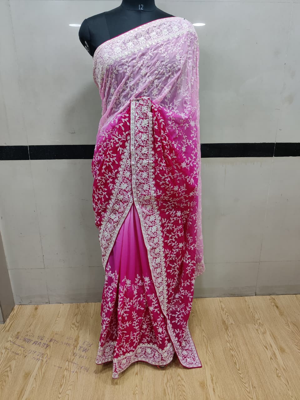 ALLOVER JAAL OF WHITE THREAD  EMBROIDERY WITH FLORAL AND BUTTIS ACROSS THE ENTIRE SAREE